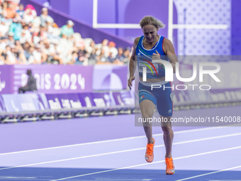 Valentina Petrillo of Team Italy competes in the Women's 400m T12 Heat 4 at Stade de France during the Paris 2024 Paralympic Games in Paris,...