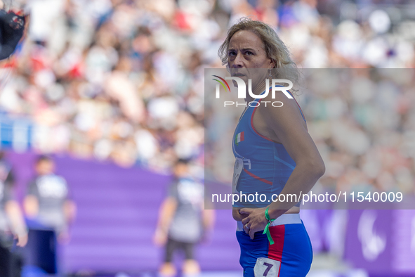 Valentina Petrillo of Team Italy reacts after qualifying for the finals in the Women's 400m T12 Heat 4 at Stade de France during the Paris 2...