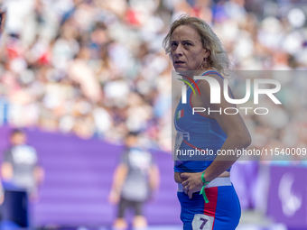 Valentina Petrillo of Team Italy reacts after qualifying for the finals in the Women's 400m T12 Heat 4 at Stade de France during the Paris 2...