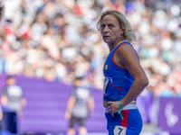 Valentina Petrillo of Team Italy reacts after qualifying for the finals in the Women's 400m T12 Heat 4 at Stade de France during the Paris 2...