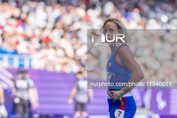 Valentina Petrillo of Team Italy reacts after qualifying for the finals in the Women's 400m T12 Heat 4 at Stade de France during the Paris 2...