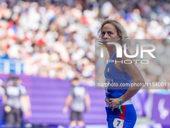 Valentina Petrillo of Team Italy reacts after qualifying for the finals in the Women's 400m T12 Heat 4 at Stade de France during the Paris 2...