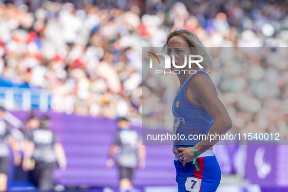 Valentina Petrillo of Team Italy reacts after qualifying for the finals in the Women's 400m T12 Heat 4 at Stade de France during the Paris 2...