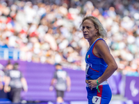 Valentina Petrillo of Team Italy reacts after qualifying for the finals in the Women's 400m T12 Heat 4 at Stade de France during the Paris 2...