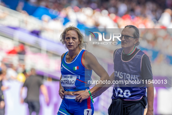 Valentina Petrillo of Team Italy reacts after qualifying for the finals in the Women's 400m T12 Heat 4 at Stade de France during the Paris 2...