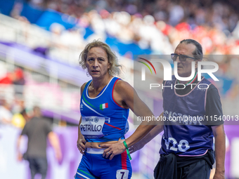 Valentina Petrillo of Team Italy reacts after qualifying for the finals in the Women's 400m T12 Heat 4 at Stade de France during the Paris 2...