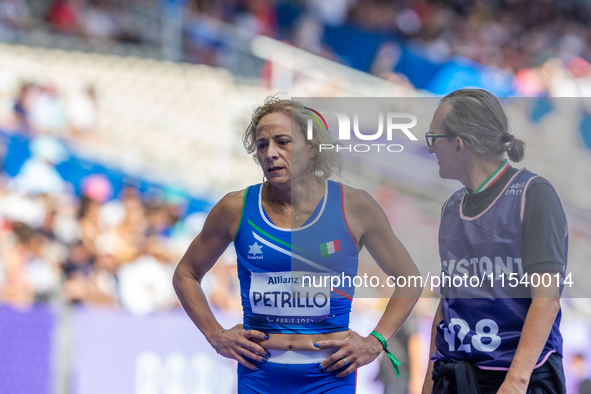 Valentina Petrillo of Team Italy reacts after qualifying for the finals in the Women's 400m T12 Heat 4 at Stade de France during the Paris 2...