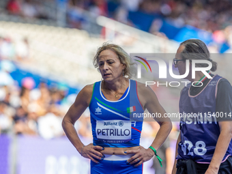 Valentina Petrillo of Team Italy reacts after qualifying for the finals in the Women's 400m T12 Heat 4 at Stade de France during the Paris 2...