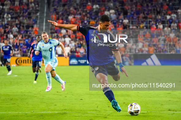 Cincinnati attacker Kevin Kelsy takes a shot on goal during the Major League Soccer match between FC Cincinnati and CF Montreal at TQL Stadi...