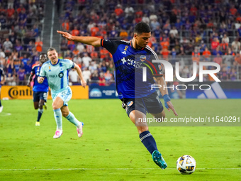 Cincinnati attacker Kevin Kelsy takes a shot on goal during the Major League Soccer match between FC Cincinnati and CF Montreal at TQL Stadi...