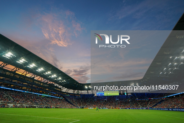 An orange and blue sky is seen at sunset during the Major League Soccer match between FC Cincinnati and CF Montreal at TQL Stadium in Cincin...