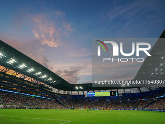 An orange and blue sky is seen at sunset during the Major League Soccer match between FC Cincinnati and CF Montreal at TQL Stadium in Cincin...