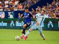 Cincinnati midfielder Luca Orellano and Montreal defender Dawid Bugaj compete for the ball during the Major League Soccer match between FC C...