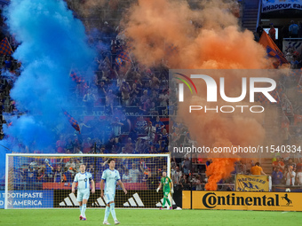 FC Cincinnati supporters celebrate a goal during the Major League Soccer match between FC Cincinnati and CF Montreal at TQL Stadium in Cinci...