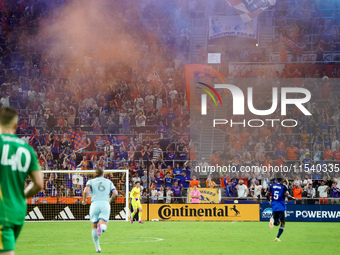 FC Cincinnati supporters celebrate a goal during the Major League Soccer match between FC Cincinnati and CF Montreal at TQL Stadium in Cinci...