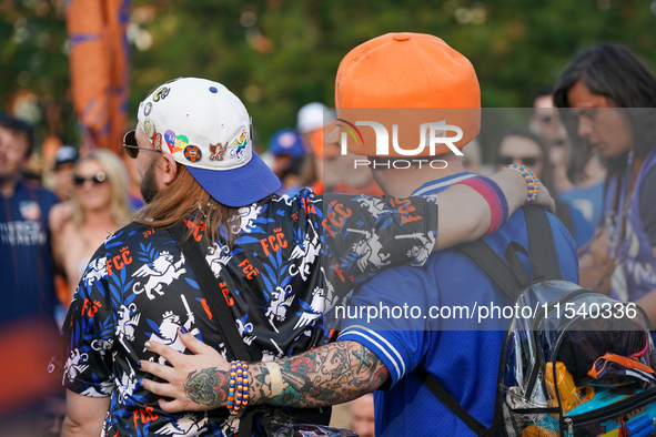 FC Cincinnati supporters are seen prior to the start of the Major League Soccer match between FC Cincinnati and CF Montreal at TQL Stadium i...