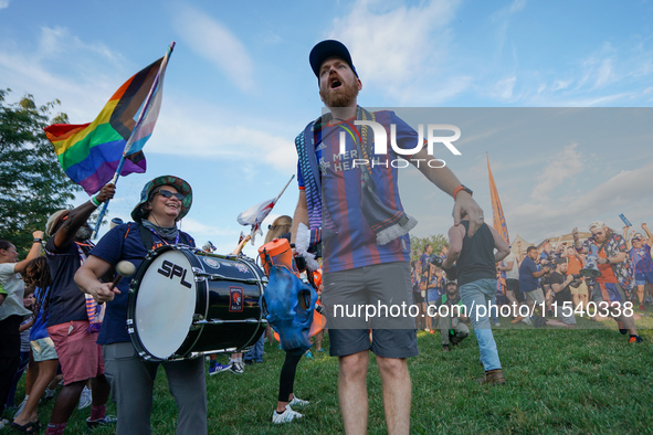 FC Cincinnati supporters are seen prior to the start of the Major League Soccer match between FC Cincinnati and CF Montreal at TQL Stadium i...