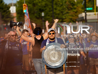 FC Cincinnati supporters are seen prior to the start of the Major League Soccer match between FC Cincinnati and CF Montreal at TQL Stadium i...