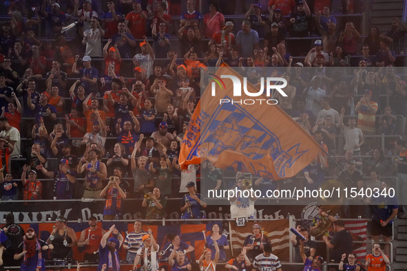 FC Cincinnati supporters celebrate a goal during the Major League Soccer match between FC Cincinnati and CF Montreal at TQL Stadium in Cinci...