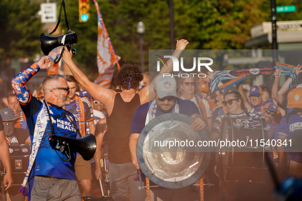 FC Cincinnati supporters are seen prior to the start of the Major League Soccer match between FC Cincinnati and CF Montreal at TQL Stadium i...