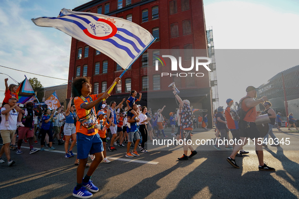 FC Cincinnati supporters are seen prior to the start of the Major League Soccer match between FC Cincinnati and CF Montreal at TQL Stadium i...