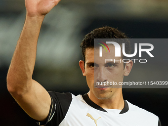 Cesar Tarrega of Valencia CF waves his hand prior to the LaLiga EA Sports match between Valencia CF and Villarreal CF at Mestalla stadium in...