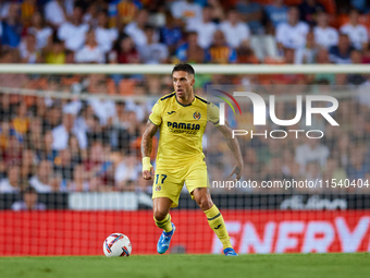 Kiko Femenia of Villarreal CF is in action during the LaLiga EA Sports match between Valencia CF and Villarreal CF at Mestalla stadium in Va...