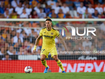 Kiko Femenia of Villarreal CF is in action during the LaLiga EA Sports match between Valencia CF and Villarreal CF at Mestalla stadium in Va...