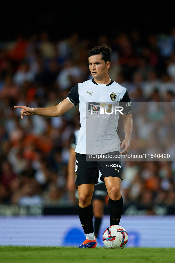 Hugo Guillamon of Valencia CF is in action during the LaLiga EA Sports match between Valencia CF and Villarreal CF at Mestalla stadium in Va...