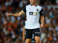 Hugo Guillamon of Valencia CF is in action during the LaLiga EA Sports match between Valencia CF and Villarreal CF at Mestalla stadium in Va...