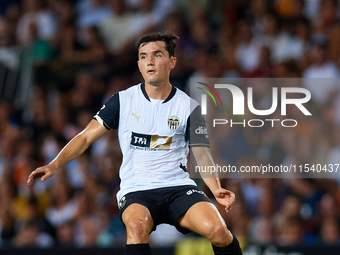 Hugo Guillamon of Valencia CF is in action during the LaLiga EA Sports match between Valencia CF and Villarreal CF at Mestalla stadium in Va...