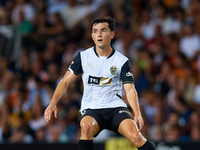 Hugo Guillamon of Valencia CF is in action during the LaLiga EA Sports match between Valencia CF and Villarreal CF at Mestalla stadium in Va...