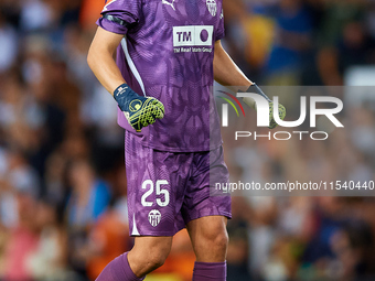 Giorgi Mamardashvili of Valencia CF reacts during the LaLiga EA Sports match between Valencia CF and Villarreal CF at Mestalla stadium in Va...