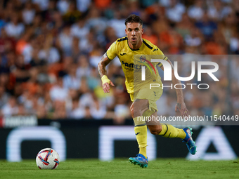 Kiko Femenia of Villarreal CF is in action during the LaLiga EA Sports match between Valencia CF and Villarreal CF at Mestalla stadium in Va...