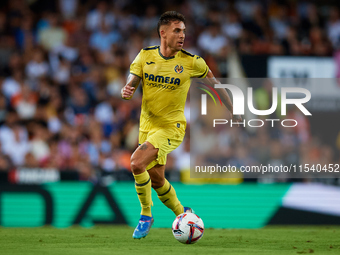 Kiko Femenia of Villarreal CF is in action during the LaLiga EA Sports match between Valencia CF and Villarreal CF at Mestalla stadium in Va...