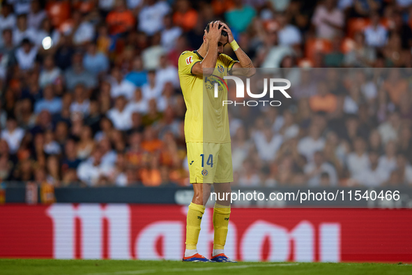 Santi Comesana Veiga of Villarreal CF reacts during the LaLiga EA Sports match between Valencia CF and Villarreal CF at Mestalla stadium in...