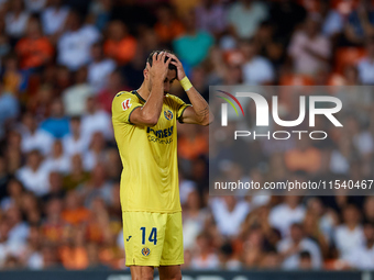 Santi Comesana Veiga of Villarreal CF reacts during the LaLiga EA Sports match between Valencia CF and Villarreal CF at Mestalla stadium in...