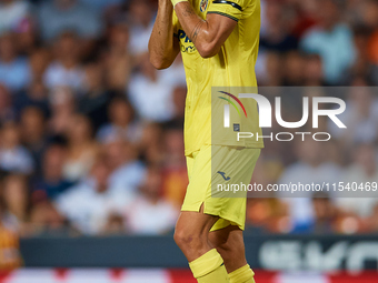 Santi Comesana Veiga of Villarreal CF reacts during the LaLiga EA Sports match between Valencia CF and Villarreal CF at Mestalla stadium in...