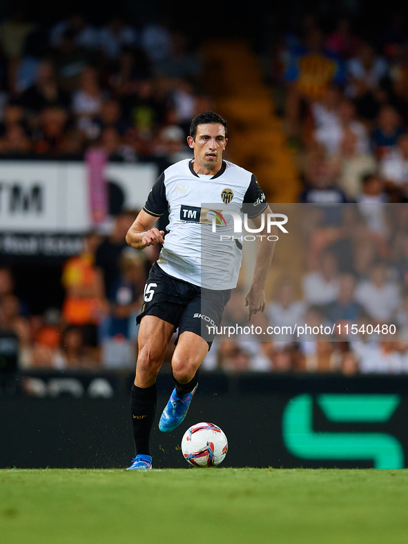 Cesar Tarrega of Valencia CF is in action during the LaLiga EA Sports match between Valencia CF and Villarreal CF at Mestalla stadium in Val...