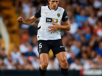 Cesar Tarrega of Valencia CF is in action during the LaLiga EA Sports match between Valencia CF and Villarreal CF at Mestalla stadium in Val...