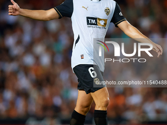 Hugo Guillamon of Valencia CF reacts during the LaLiga EA Sports match between Valencia CF and Villarreal CF at Mestalla stadium in Valencia...