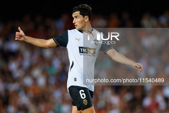 Hugo Guillamon of Valencia CF reacts during the LaLiga EA Sports match between Valencia CF and Villarreal CF at Mestalla stadium in Valencia...