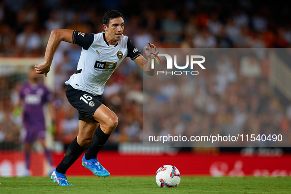 Cesar Tarrega of Valencia CF is in action during the LaLiga EA Sports match between Valencia CF and Villarreal CF at Mestalla stadium in Val...