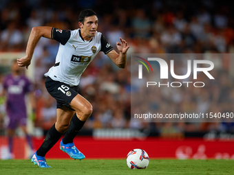 Cesar Tarrega of Valencia CF is in action during the LaLiga EA Sports match between Valencia CF and Villarreal CF at Mestalla stadium in Val...