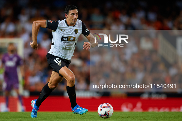 Cesar Tarrega of Valencia CF is in action during the LaLiga EA Sports match between Valencia CF and Villarreal CF at Mestalla stadium in Val...