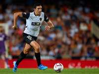 Cesar Tarrega of Valencia CF is in action during the LaLiga EA Sports match between Valencia CF and Villarreal CF at Mestalla stadium in Val...