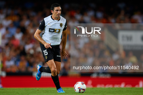 Cesar Tarrega of Valencia CF is in action during the LaLiga EA Sports match between Valencia CF and Villarreal CF at Mestalla stadium in Val...