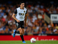 Cesar Tarrega of Valencia CF is in action during the LaLiga EA Sports match between Valencia CF and Villarreal CF at Mestalla stadium in Val...