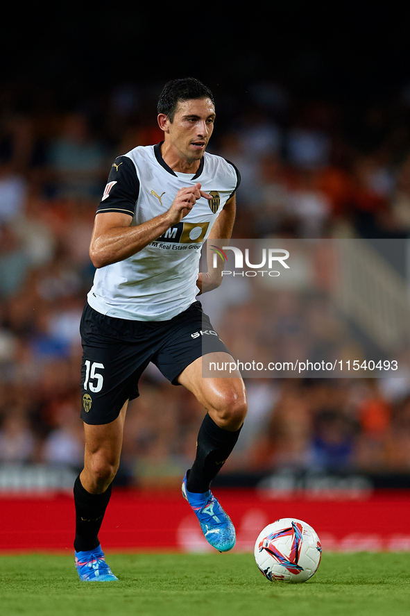 Cesar Tarrega of Valencia CF is in action during the LaLiga EA Sports match between Valencia CF and Villarreal CF at Mestalla stadium in Val...