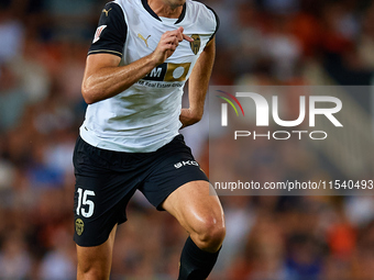 Cesar Tarrega of Valencia CF is in action during the LaLiga EA Sports match between Valencia CF and Villarreal CF at Mestalla stadium in Val...